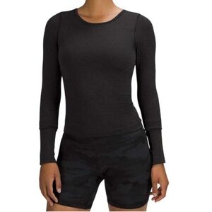 Lululemon Womens 12 Black Ebb to Street Waist-Length Long Sleeve Shirt.